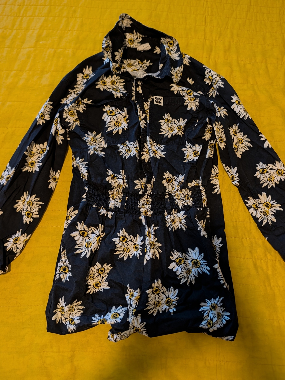 Lucy & Yak Black Floral Zip Romper with White and Yellow Daisies